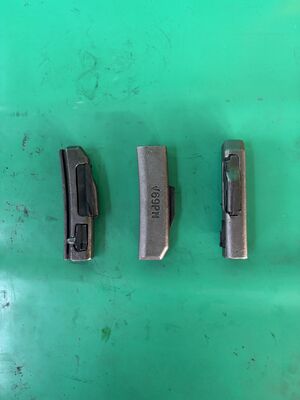 Pin de bloqueo del adaptador de los accesorios de los dientes del cubo de los recambios del excavador V69PN